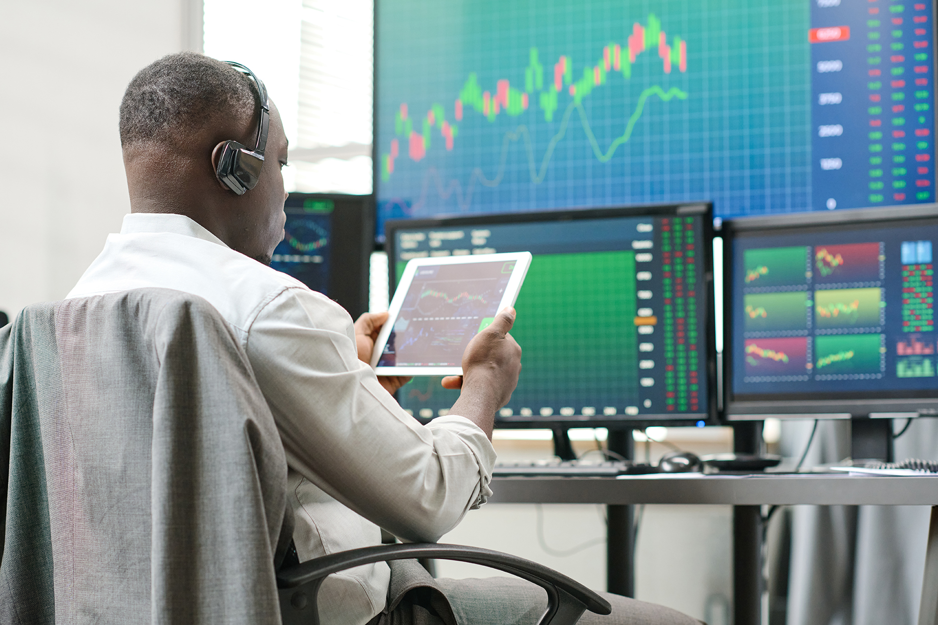 pic of man at bank of computers