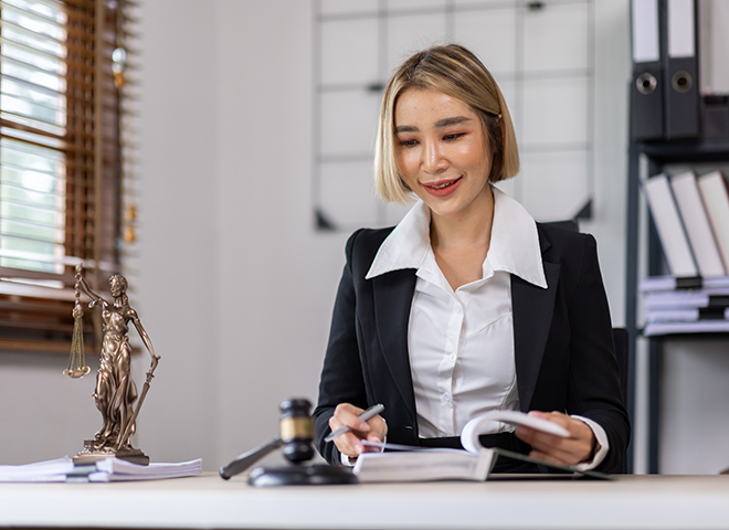 Picture of Jenny Wong at her desk